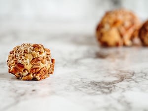 Keto fat bombs are small, bite-sized treats. They are generally made sweet with a keto sweetener like Swerve and have a high-fat content. Keto Fat bombs are often kept in the freezer or fridge and can be made as balls, mini-muffins, candies and so forth.